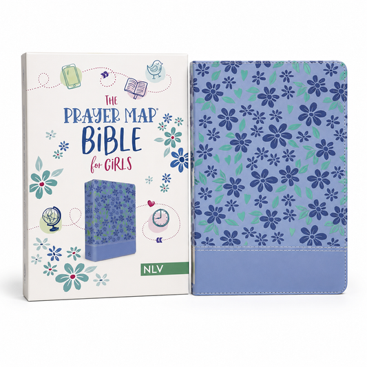 The Prayer Map Bible for Girls NLV shown with its illustrated retail box on a white background. The Bible has a blue floral pattern on the cover, and the box is cream with blue, teal, and pink decorative illustrations.